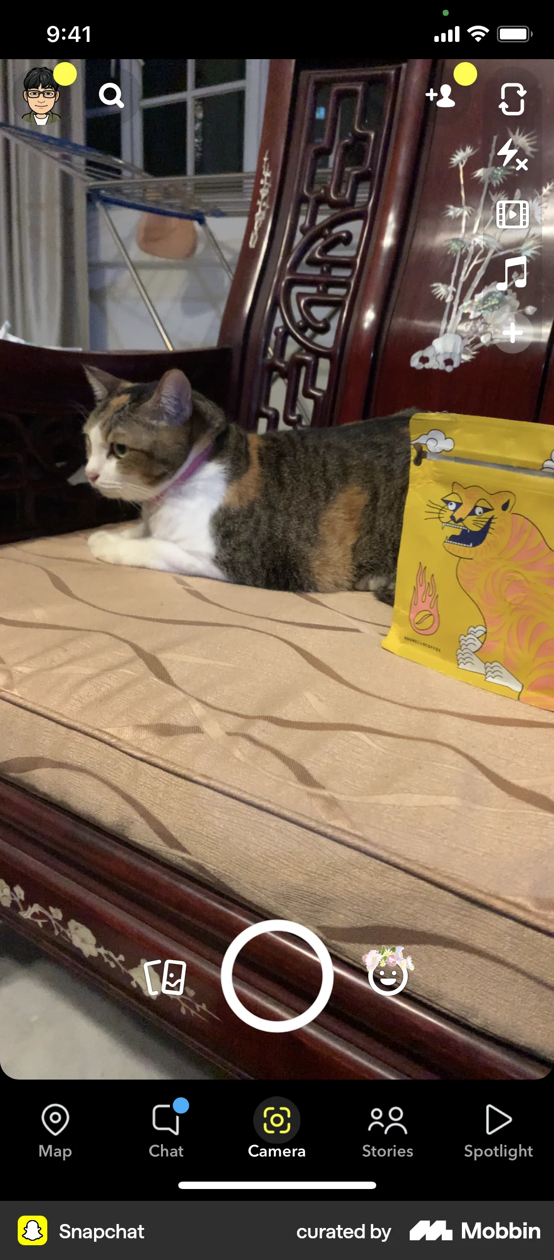 Snapchat iOS screen containing Floating Action Button UI element