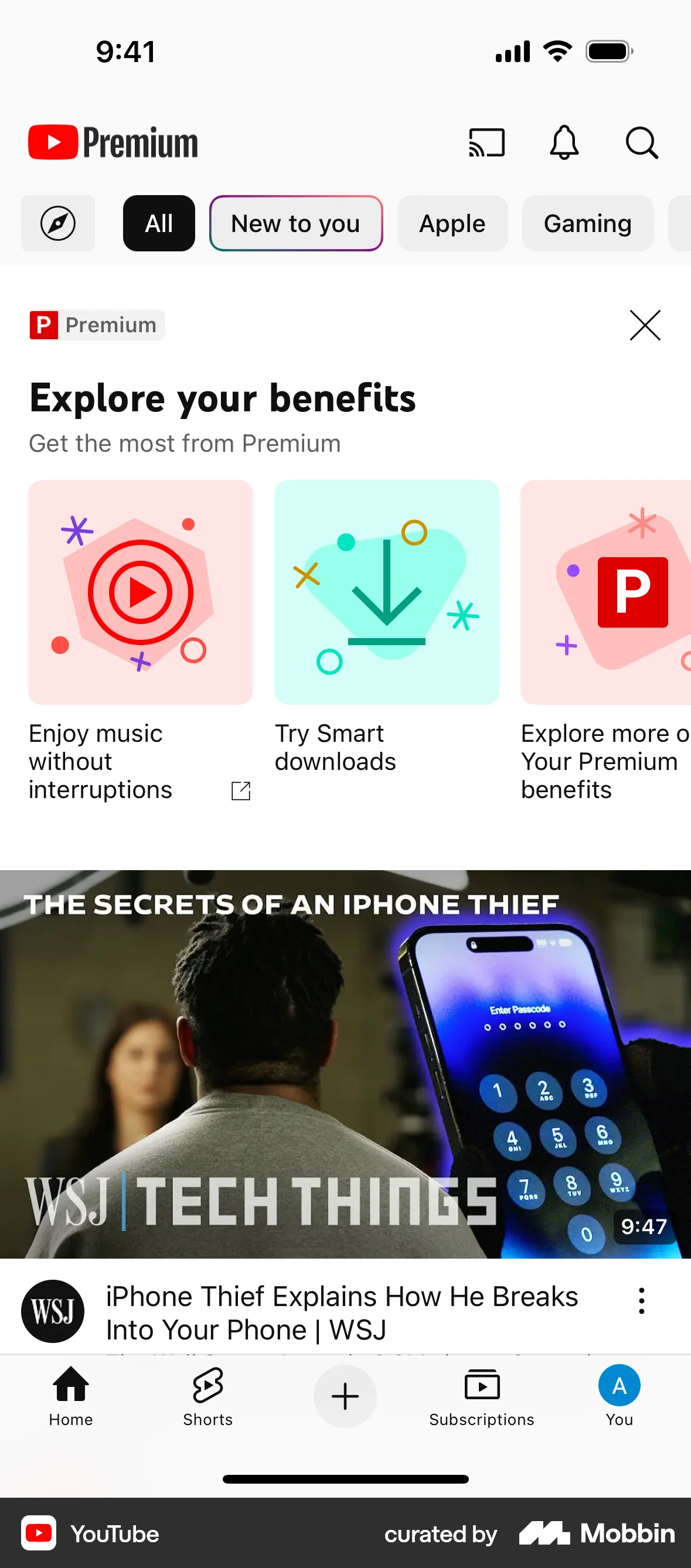 YouTube iOS screen containing Tab Bar UI element